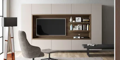 A living room with a tv and shelves in it