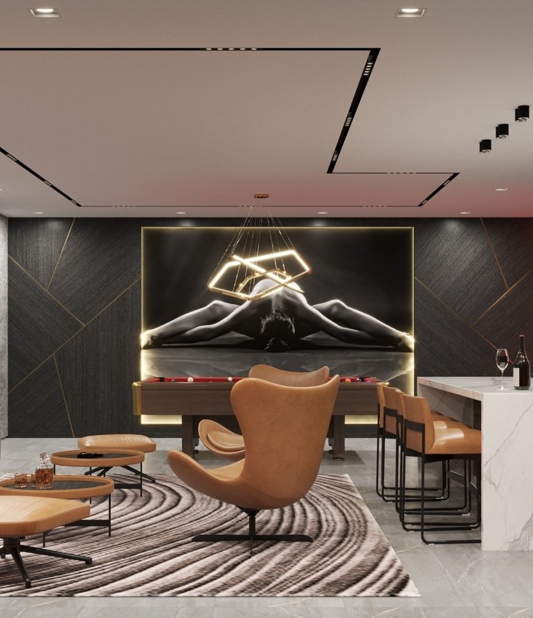 Luxury basement game room with 11Ravens pool table | Karamia Designs