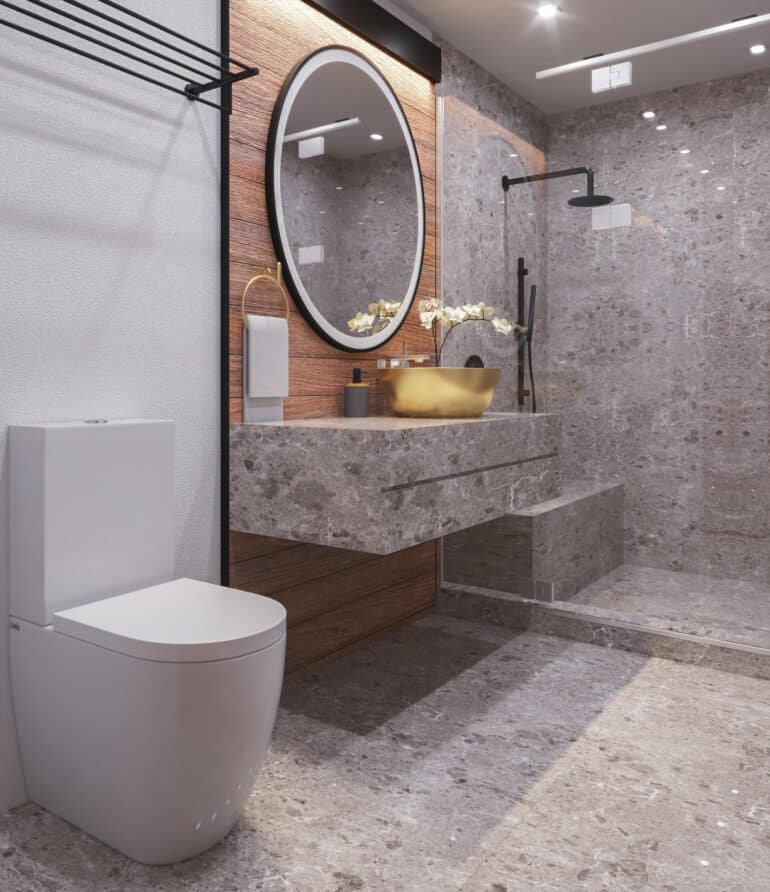 A bathroom with a toilet and sink in it