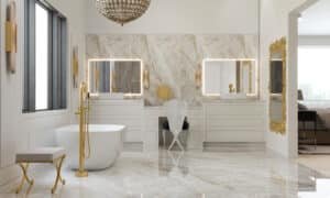 The master bathroom features a luxurious centerpiece—a freestanding bathtub beneath a custom-made raw crystal chandelier. Large windows bring in natural light and offer stunning mountain views. The dual vanity, adorned with LEE mirrors, includes a dedicated makeup table for added convenience. The walk-in shower showcases natural Taj Mahal marble and premium THG fixtures, while the restroom is thoughtfully separated for privacy.