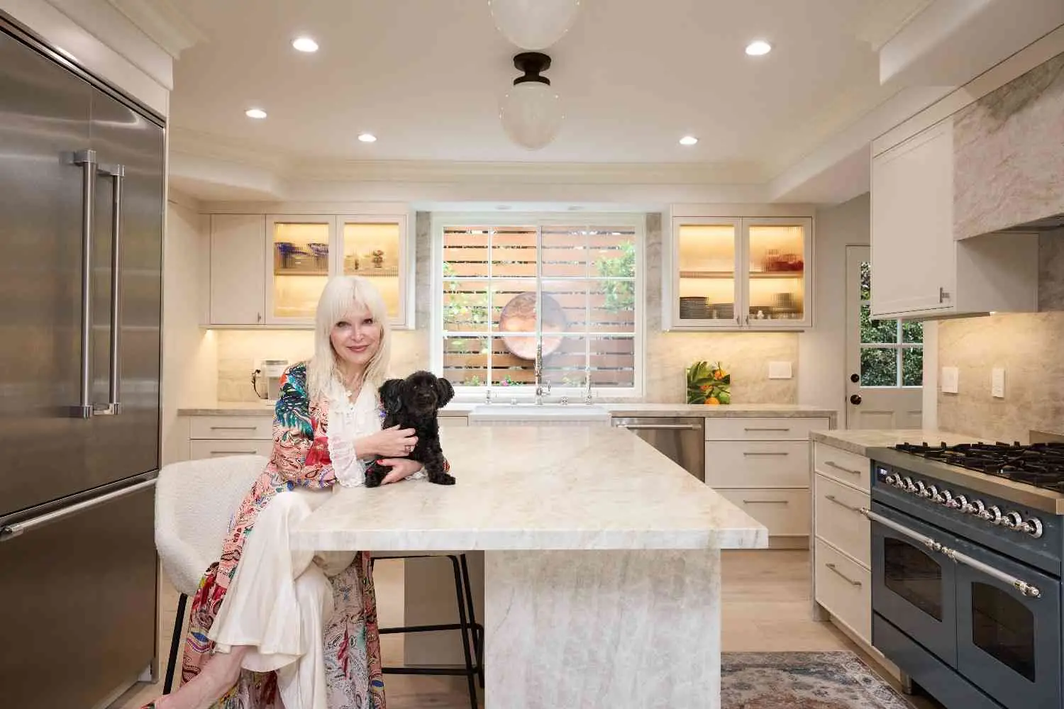 Designer in modern marble kitchen | Karamia Designs